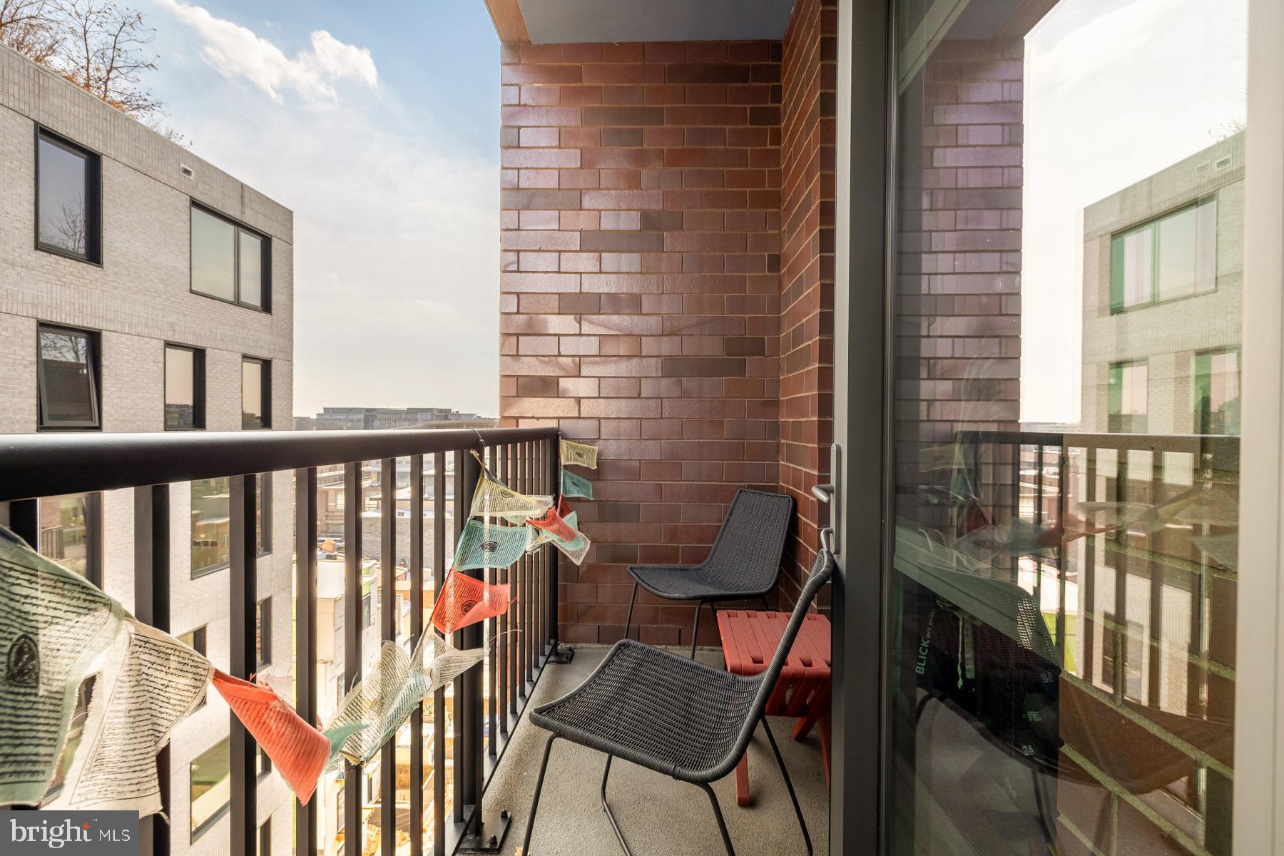 810 O Street Northwest, Unit 809 Washington, DC 20001 - Photo 20 of 30 a view of a balcony with an outdoor seating