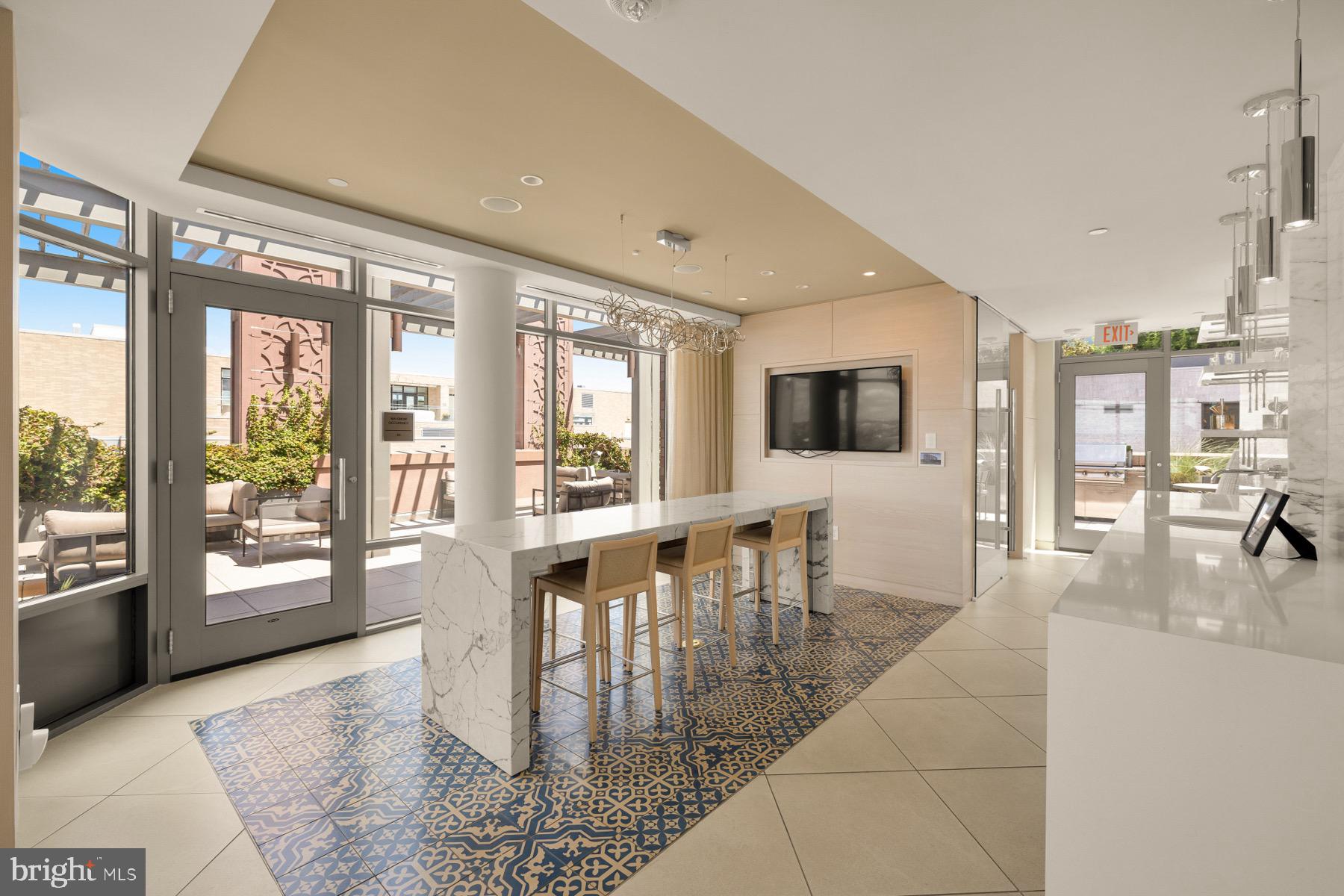 810 O Street Northwest, Unit 809 Washington, DC 20001 - Photo 23 of 30 a dining room with furniture and wooden floor