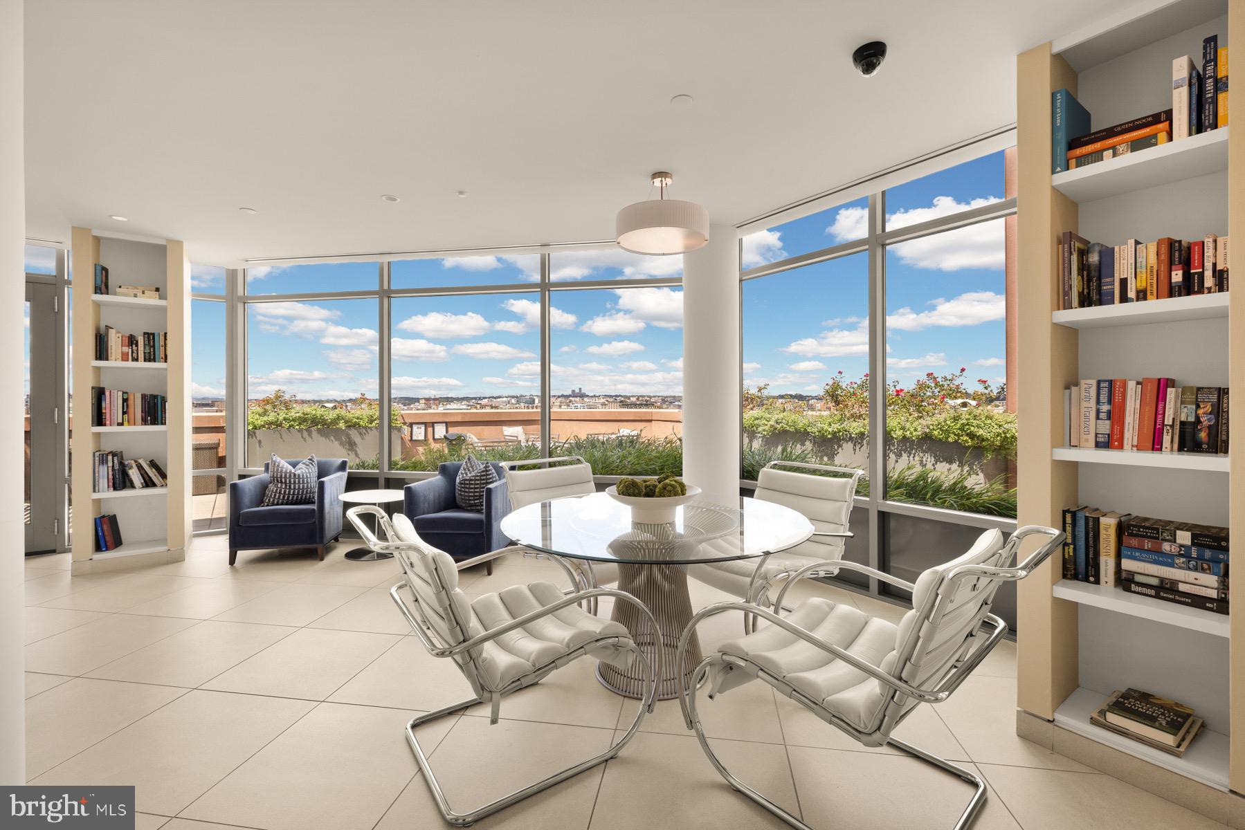 810 O Street Northwest, Unit 809 Washington, DC 20001 - Photo 24 of 30 a living room with furniture and a large window