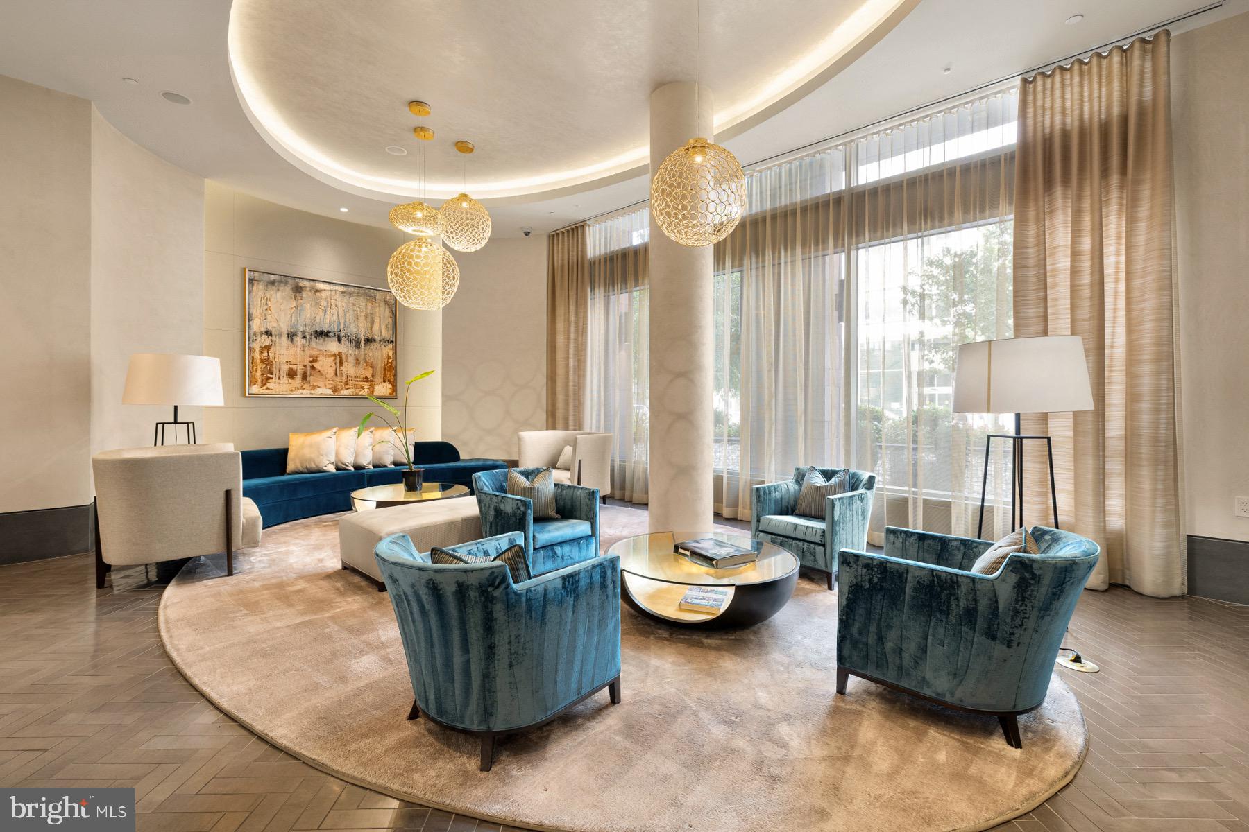 810 O Street Northwest, Unit 809 Washington, DC 20001 - Photo 29 of 30 a living room with furniture and large windows