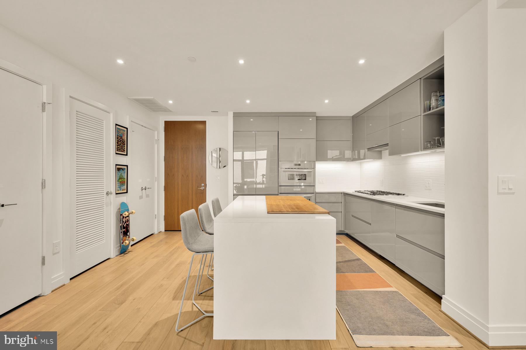 810 O Street Northwest, Unit 809 Washington, DC 20001 - Photo 4 of 30 a kitchen with counter top space and appliances
