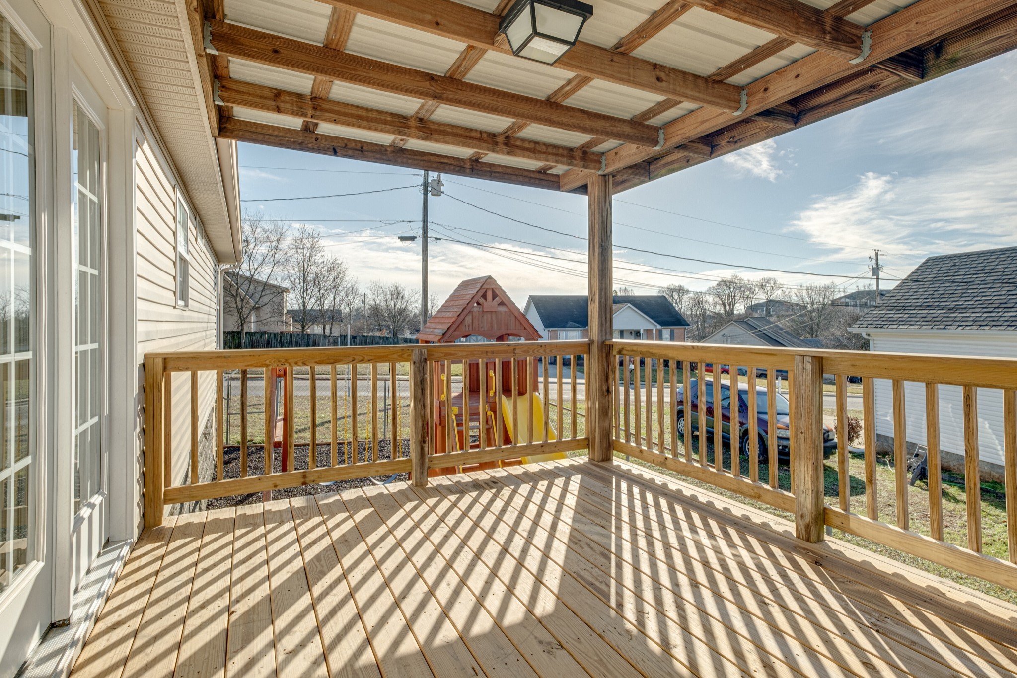 1029 Windtree Trace Mount Juliet, TN 37122 - Photo 16 of 18 a view of a balcony with wooden floor