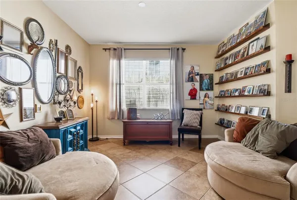 a living room with furniture and a window