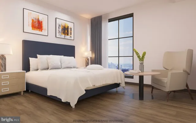 a bedroom with a bed and a couch