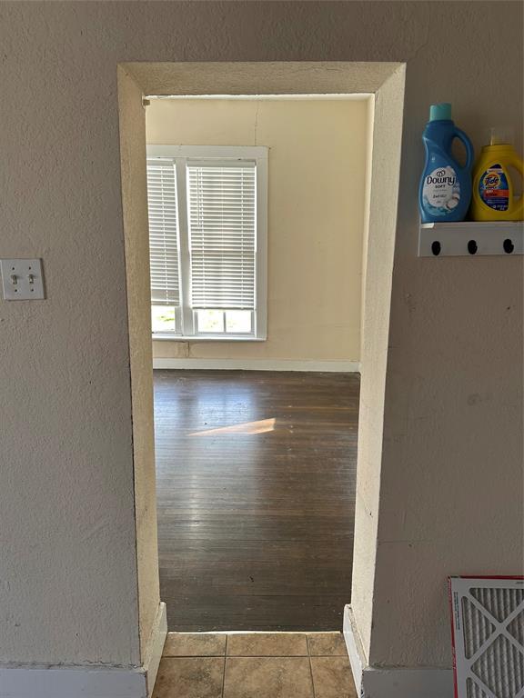607 Northwest Main Ennis, TX 75119 - Photo 13 of 16 From kitchen to living area