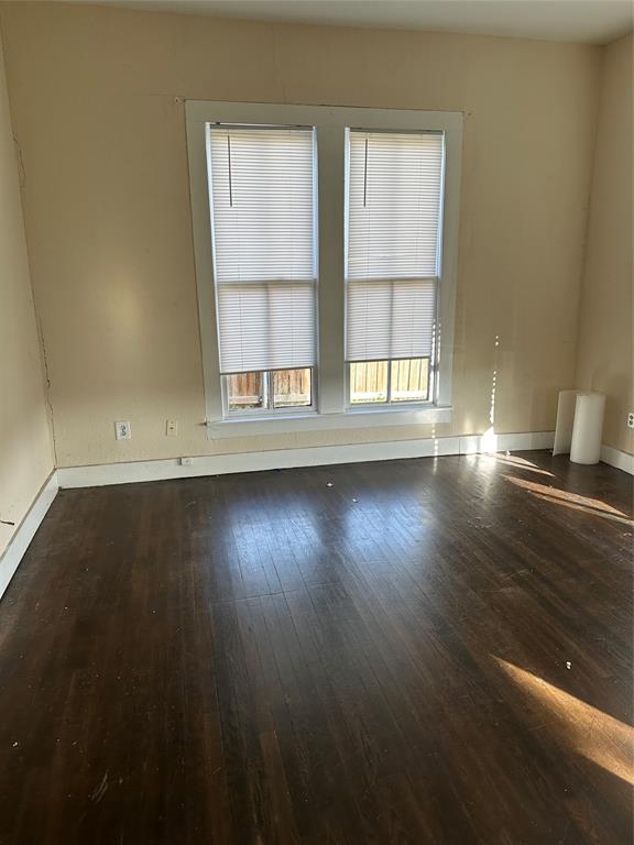 607 Northwest Main Ennis, TX 75119 - Photo 15 of 16 View of living room from entry