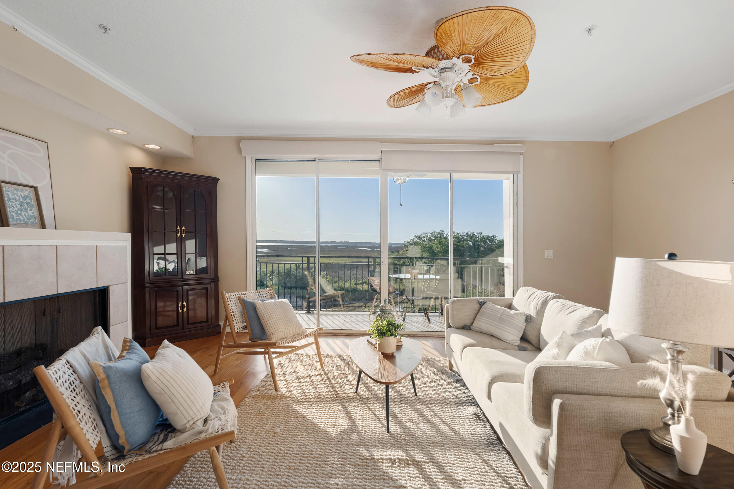 2102 Windjammer Lane St. Augustine, FL 32084 - Photo 13 of 47 a living room with furniture fireplace and a large window