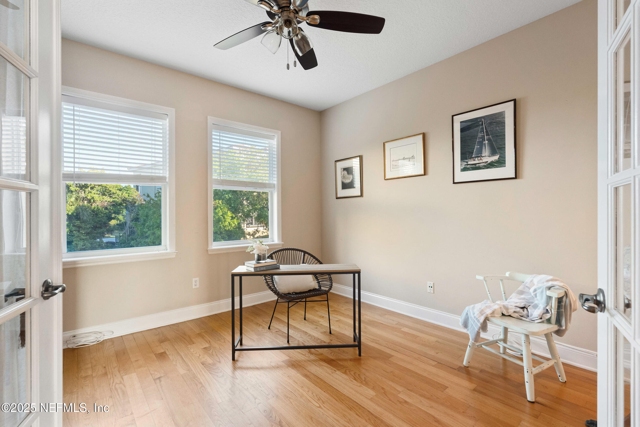 2102 Windjammer Lane St. Augustine, FL 32084 - Photo 19 of 47 a workspace with wooden floor and a window