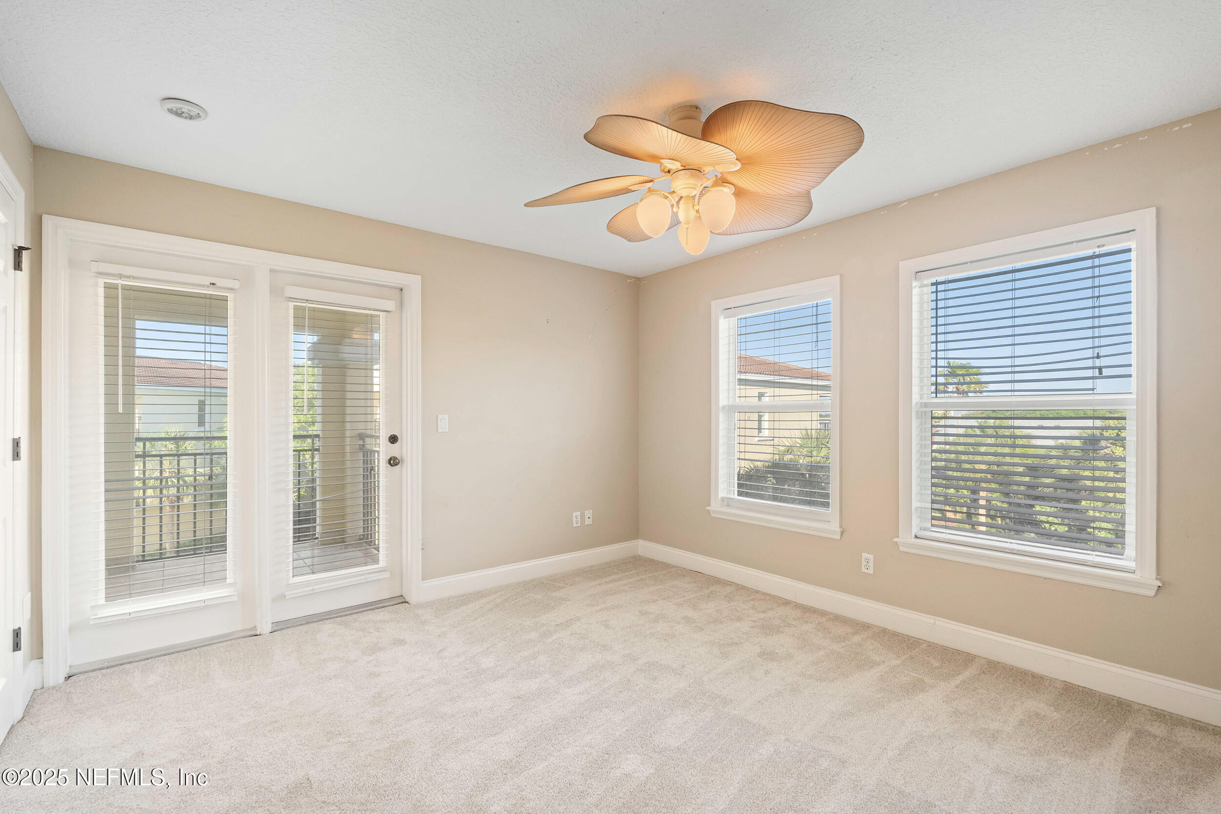 2102 Windjammer Lane St. Augustine, FL 32084 - Photo 31 of 47 a view of an empty room with a window