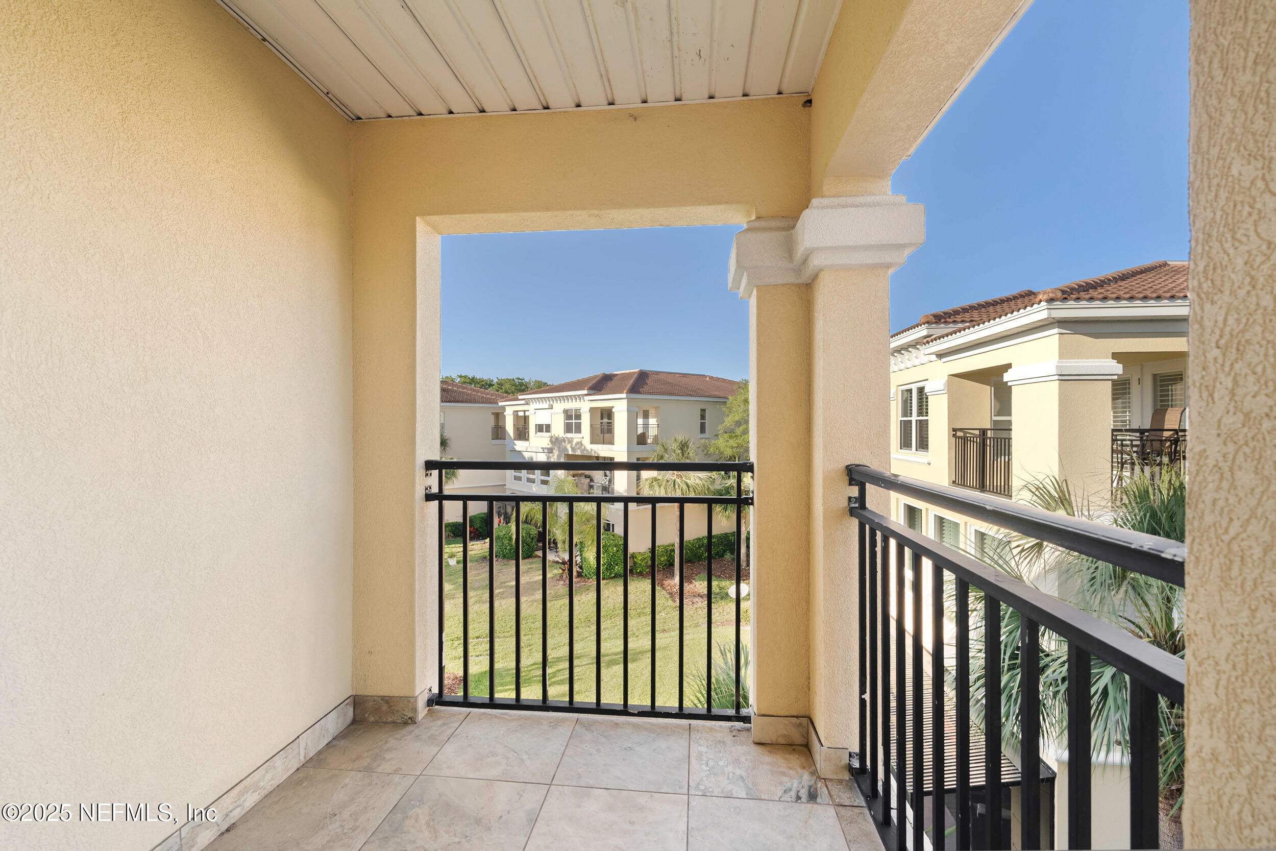 2102 Windjammer Lane St. Augustine, FL 32084 - Photo 34 of 47 a view of a brick house with a large window