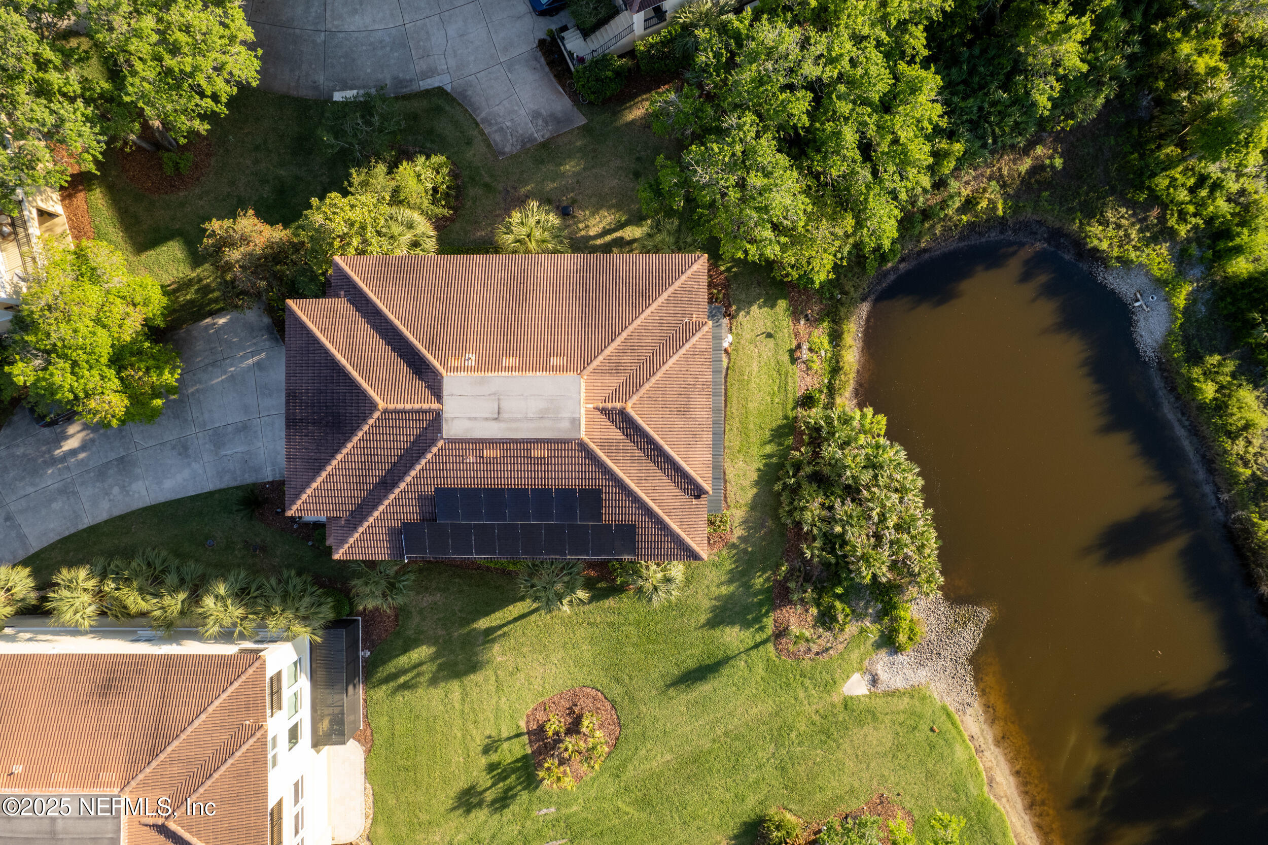 2102 Windjammer Lane St. Augustine, FL 32084 - Photo 43 of 47 an aerial view of a house with a yard