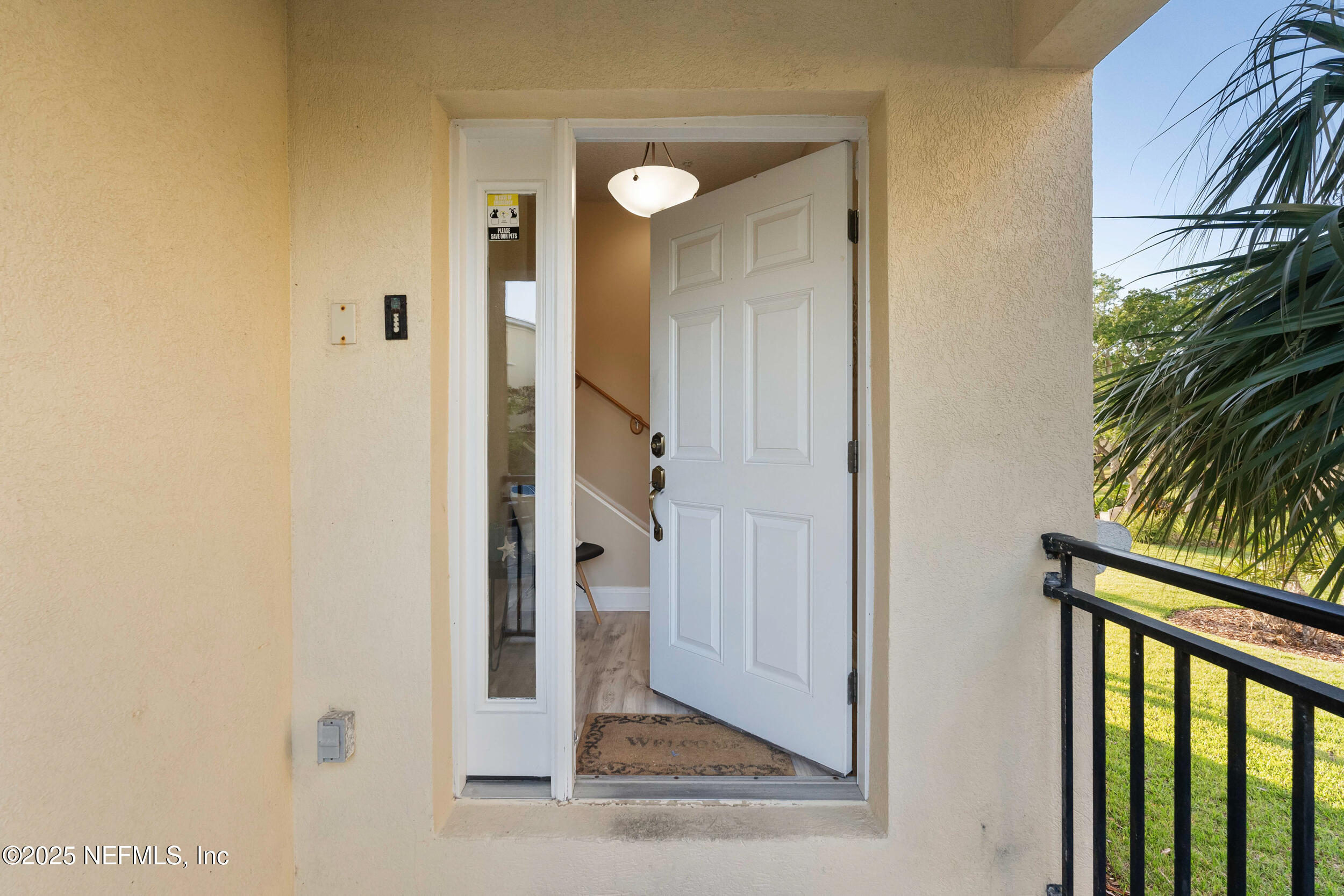 2102 Windjammer Lane St. Augustine, FL 32084 - Photo 9 of 47 a view of a bathroom from a hallway