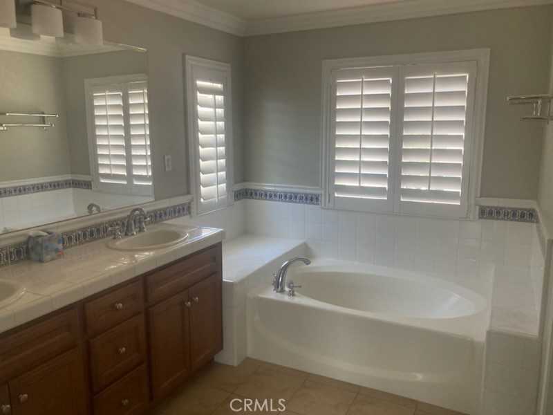 61 Autumn Irvine, CA 92602 - Photo 10 of 14 a white bath tub sitting next to a window