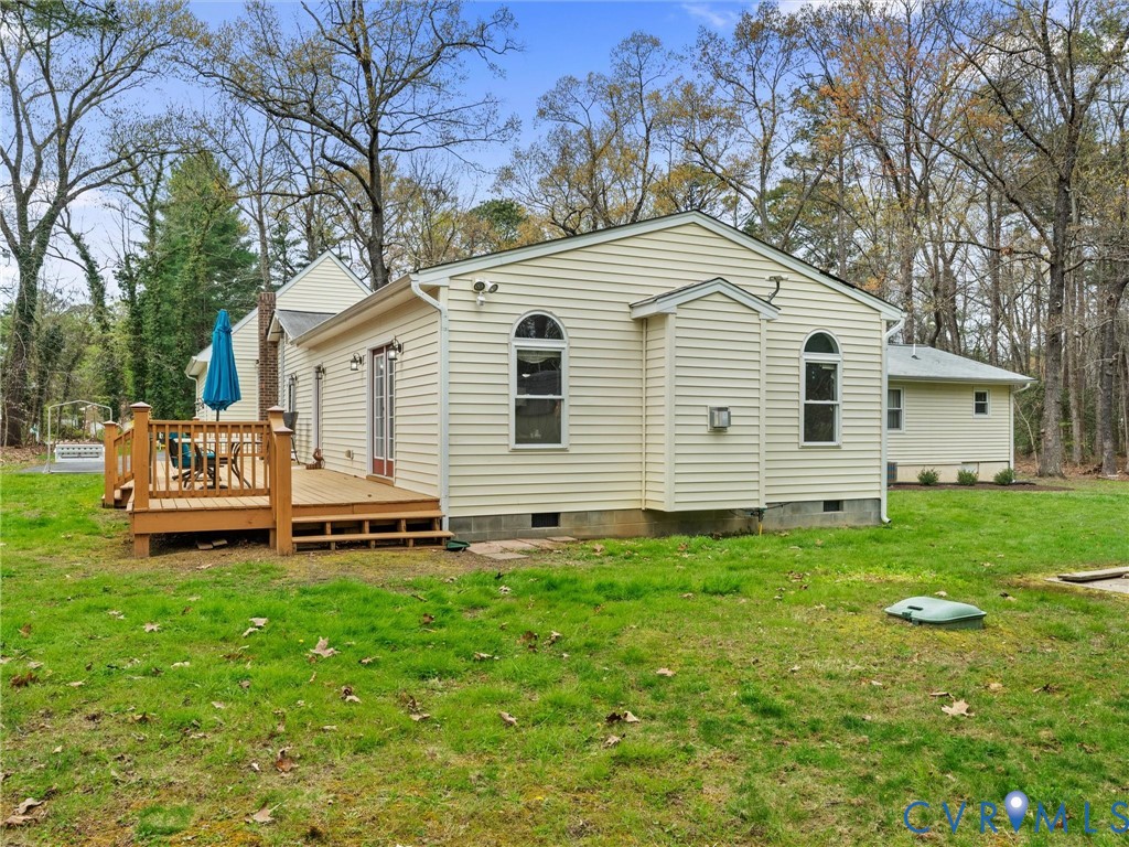 10488 Old Telegraph Road Ashland, VA 23005 - Photo 63 of 69 a backyard of a house with table and chairs