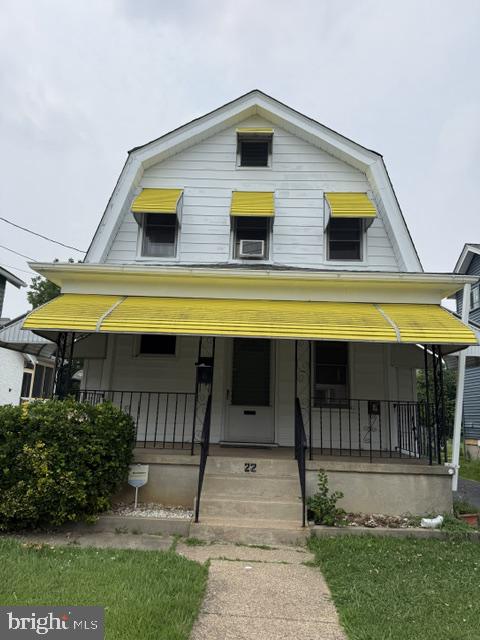 22 West Roland Road Brookhaven, PA 19015 - Photo 1 of 8 Charming home with sunny yellow awnings.