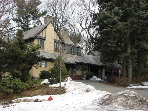 83 Agawam Road Newton, MA 02462 - Photo 1 of 1 a front view of a house with a yard and garage