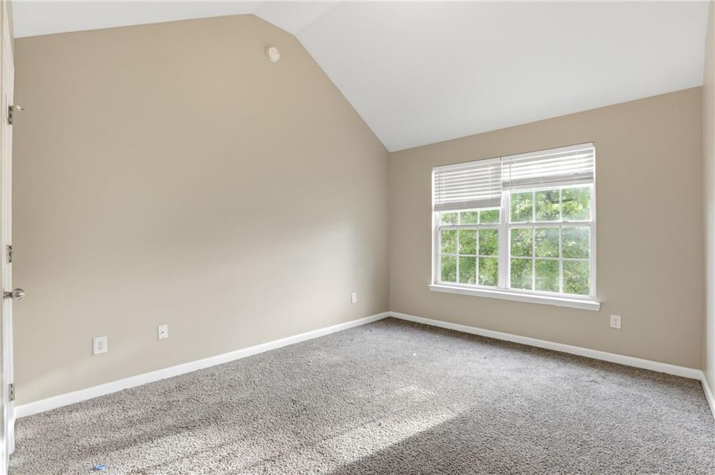 4968 Locherby Drive Fairburn, GA 30213 - Photo 29 of 39 an empty room with a window