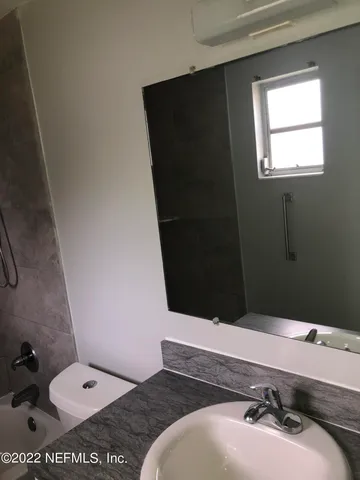 a bathroom with a sink and a toilet
