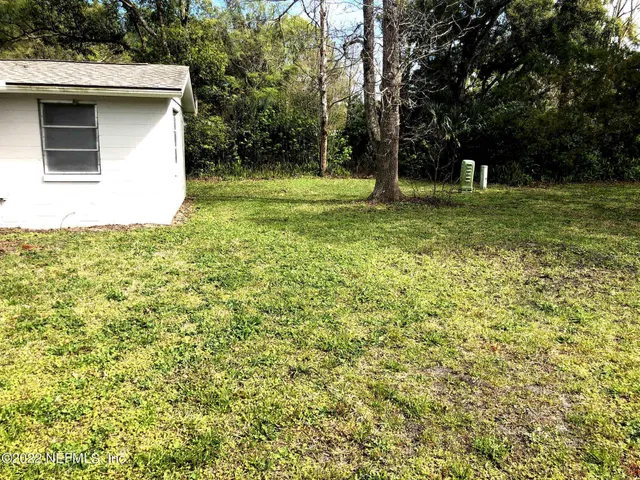 a view of outdoor space and yard