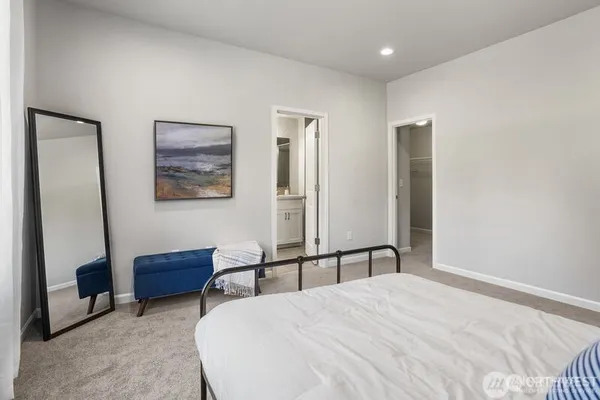 a bathroom with a sink double vanity and a mirror