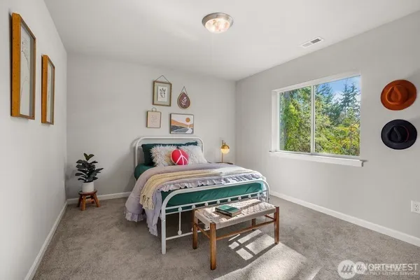 a bathroom with a toilet and a sink