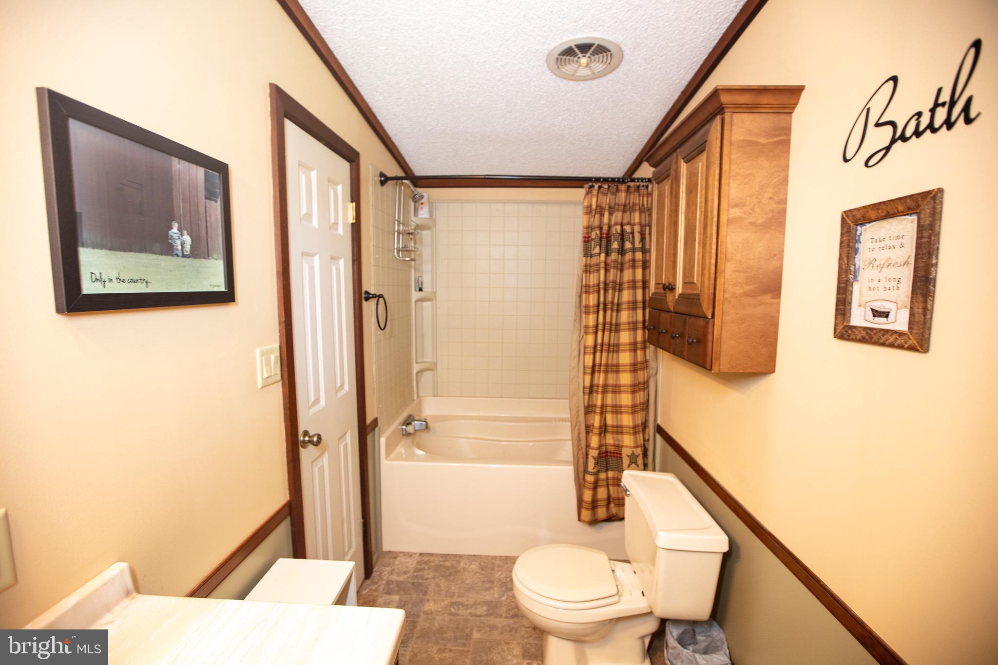 2555 Fords Corner Road Hartly, DE 19953 - Photo 33 of 43 a bathroom with a toilet and a shower