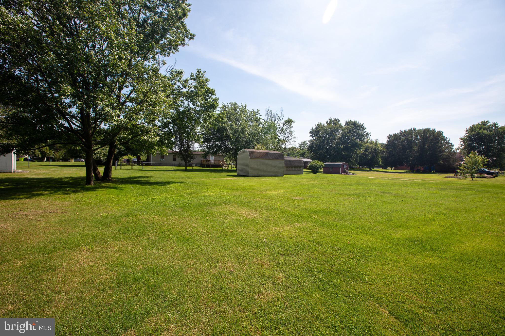 2555 Fords Corner Road Hartly, DE 19953 - Photo 8 of 43 a view of a grassy field with trees