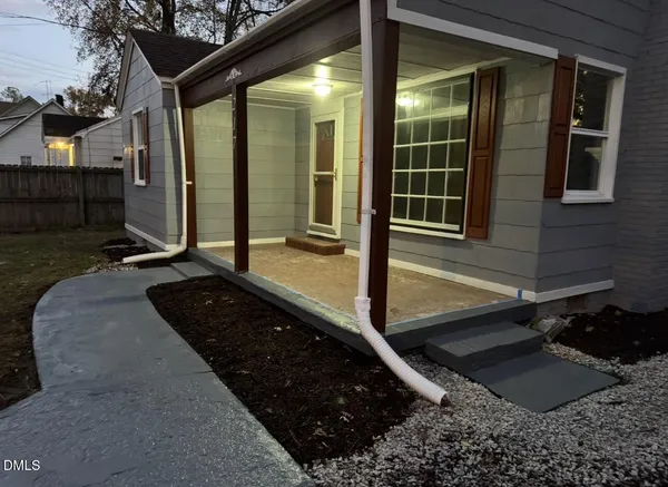 a view of a backyard of a house