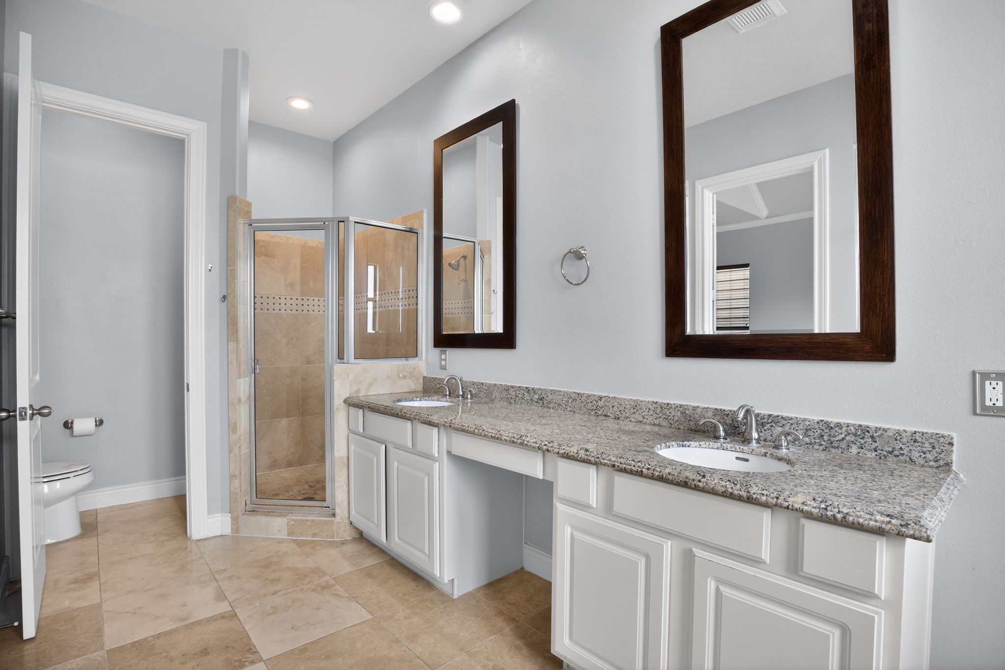 5719 Darling Street Houston, TX 77007 - Photo 12 of 35 a bathroom with a granite countertop sink toilet and shower