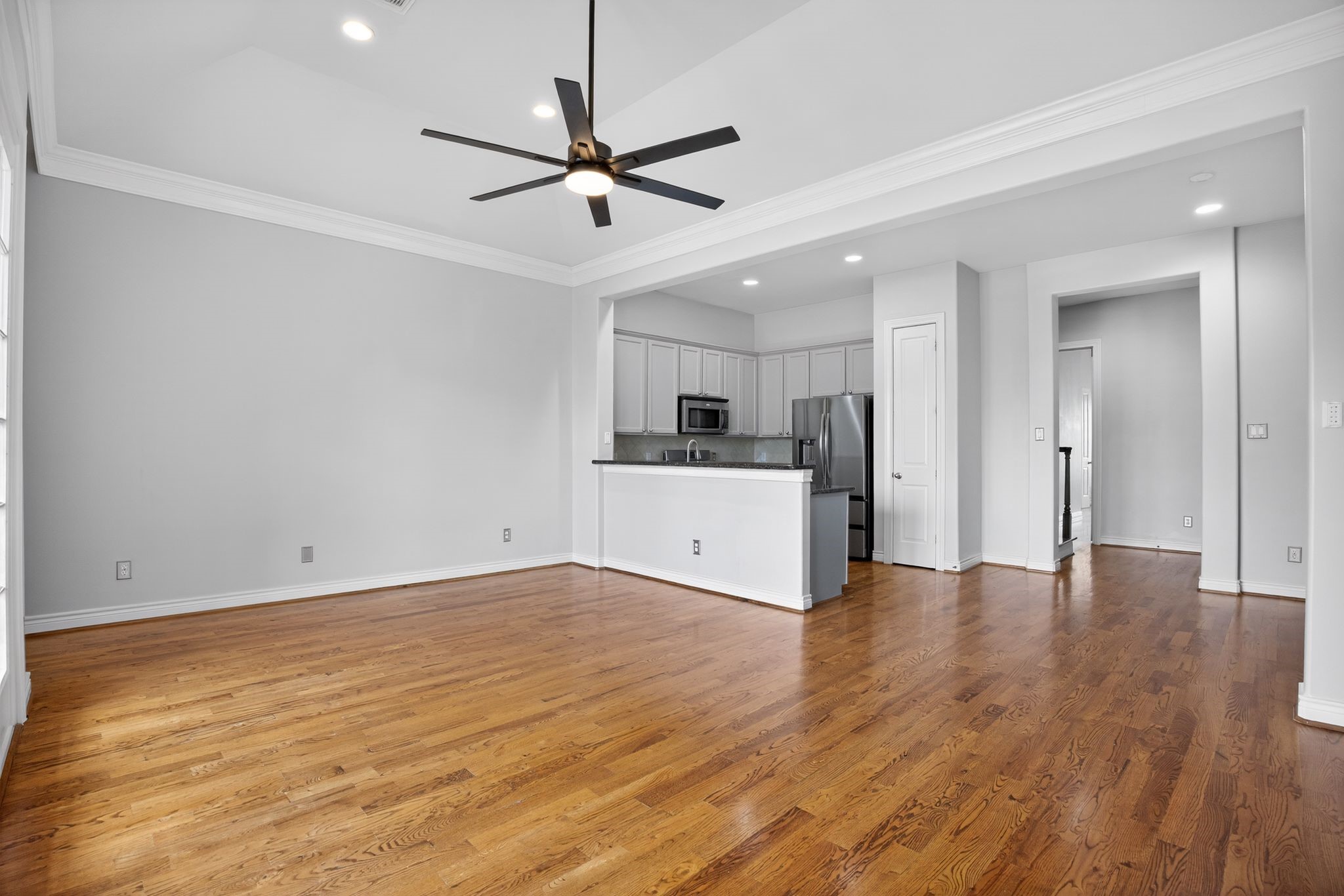 5719 Darling Street Houston, TX 77007 - Photo 17 of 35 a view of a kitchen with a sink and a window