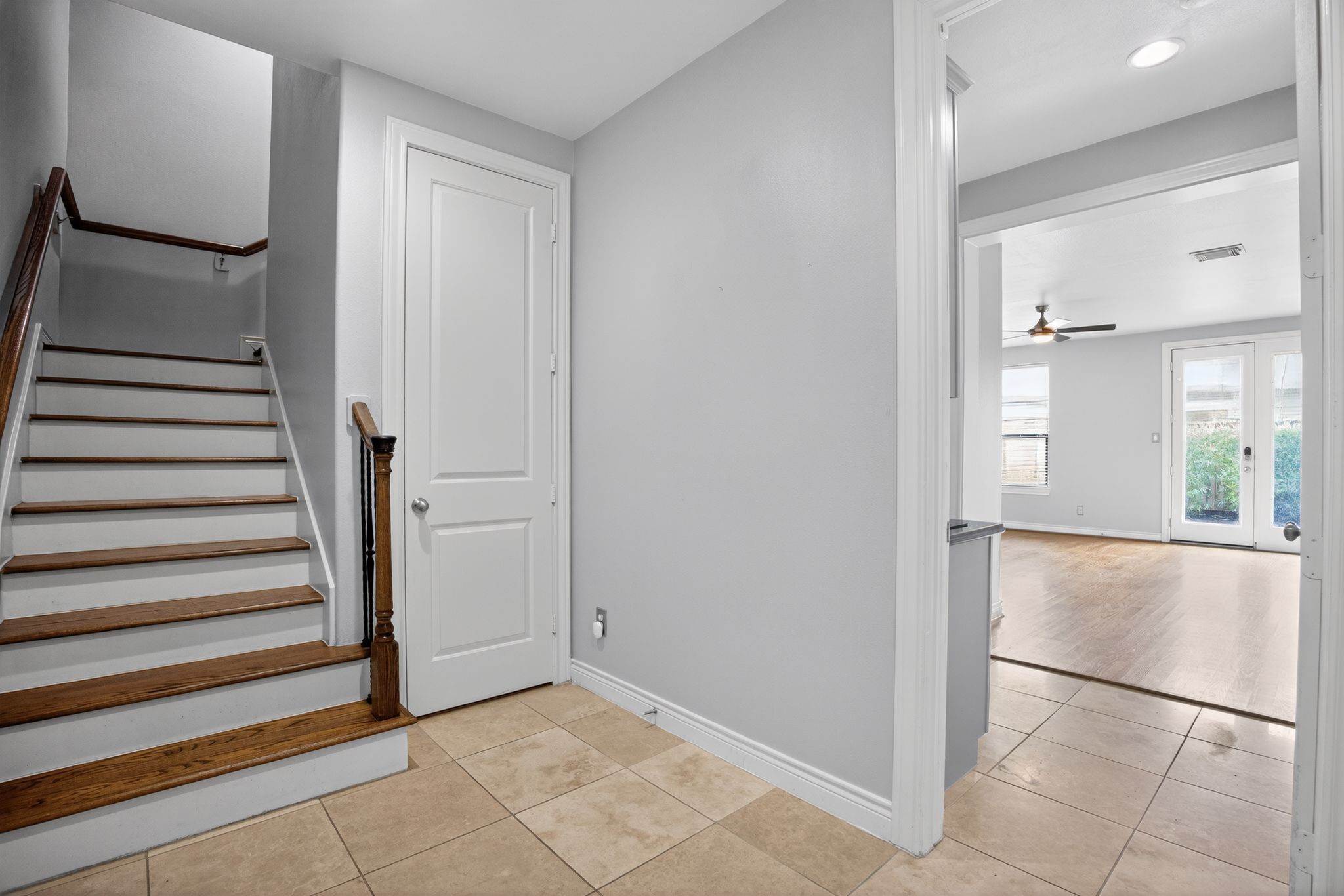 5719 Darling Street Houston, TX 77007 - Photo 2 of 35 a view of entryway with wooden floor and stairs