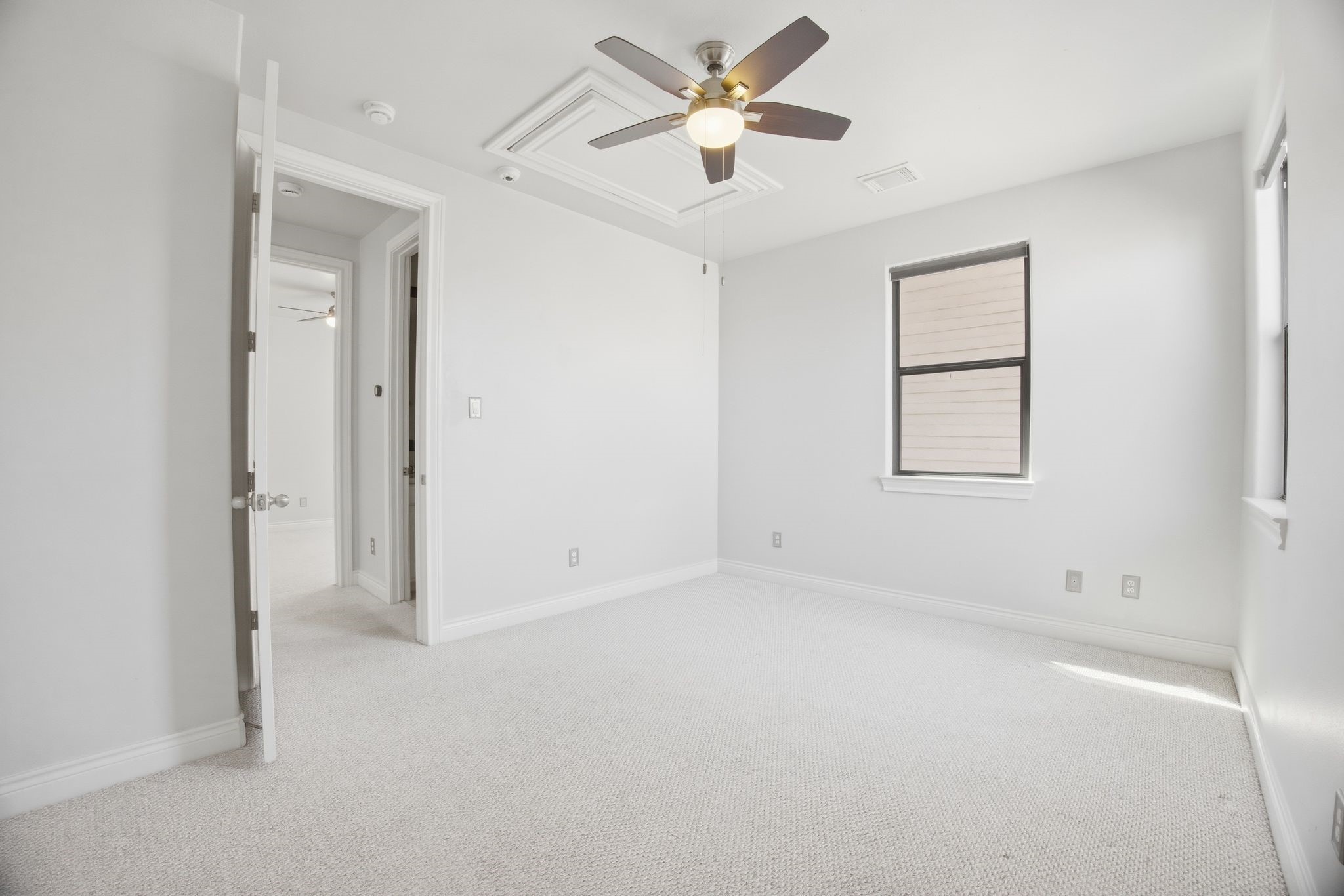5719 Darling Street Houston, TX 77007 - Photo 24 of 35 a view of an empty room with a window