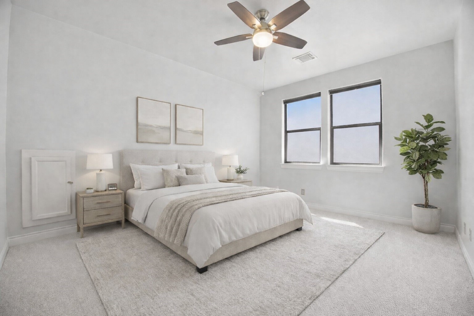 5719 Darling Street Houston, TX 77007 - Photo 26 of 35 a bedroom with a large bed and a chandelier fan