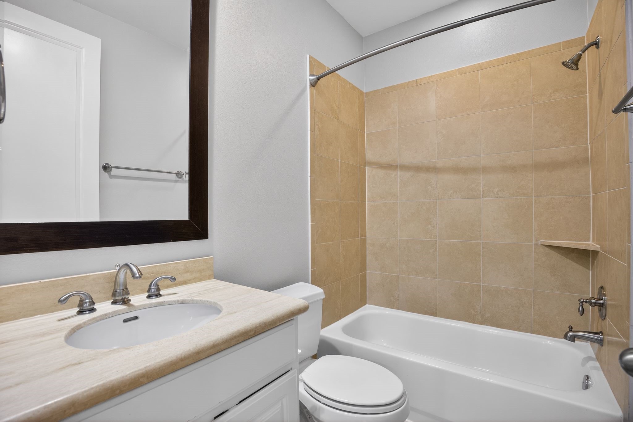 5719 Darling Street Houston, TX 77007 - Photo 29 of 35 a bathroom with a granite countertop sink toilet and shower