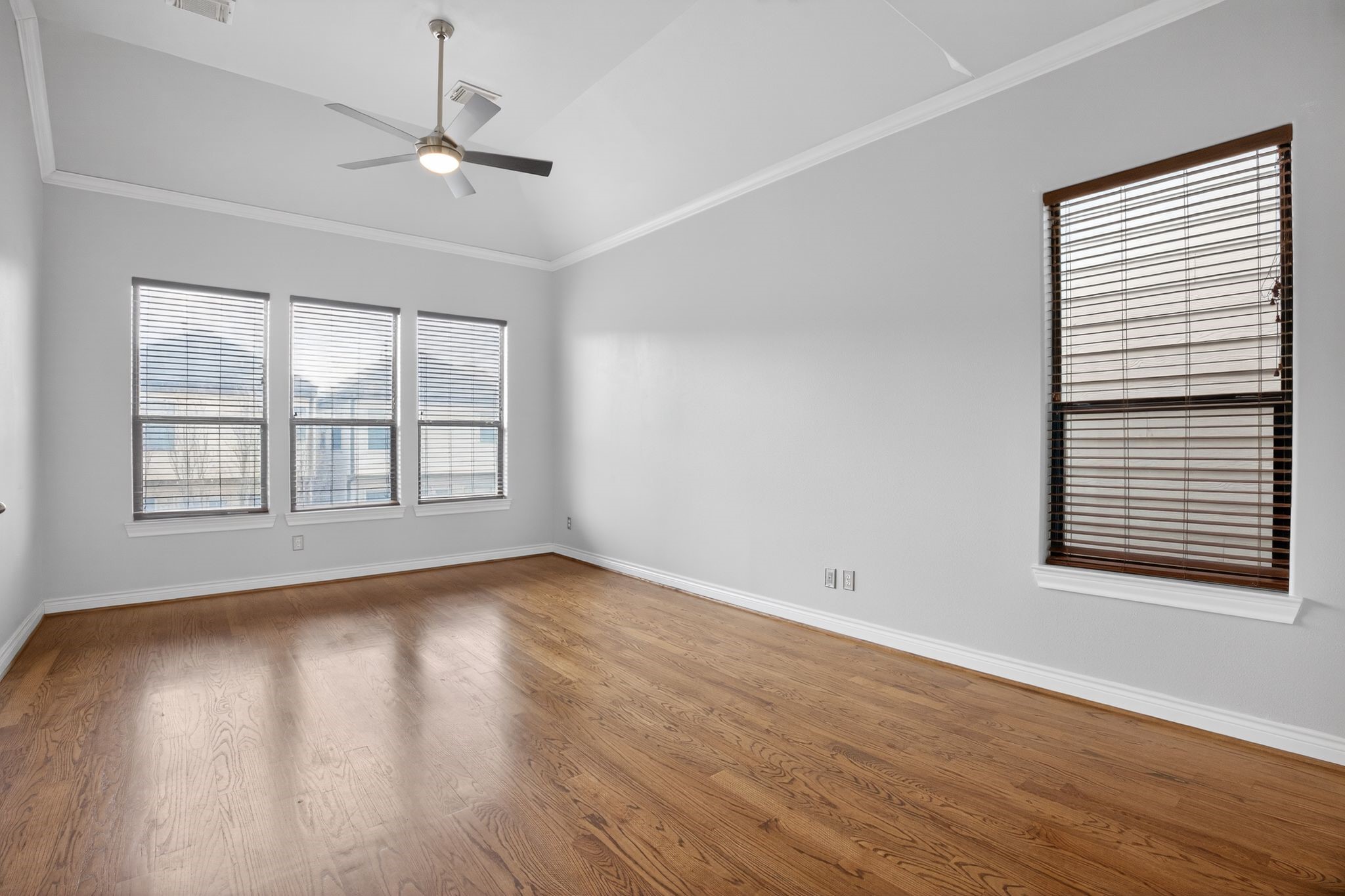 5719 Darling Street Houston, TX 77007 - Photo 10 of 35 wooden floor in an empty room with a window