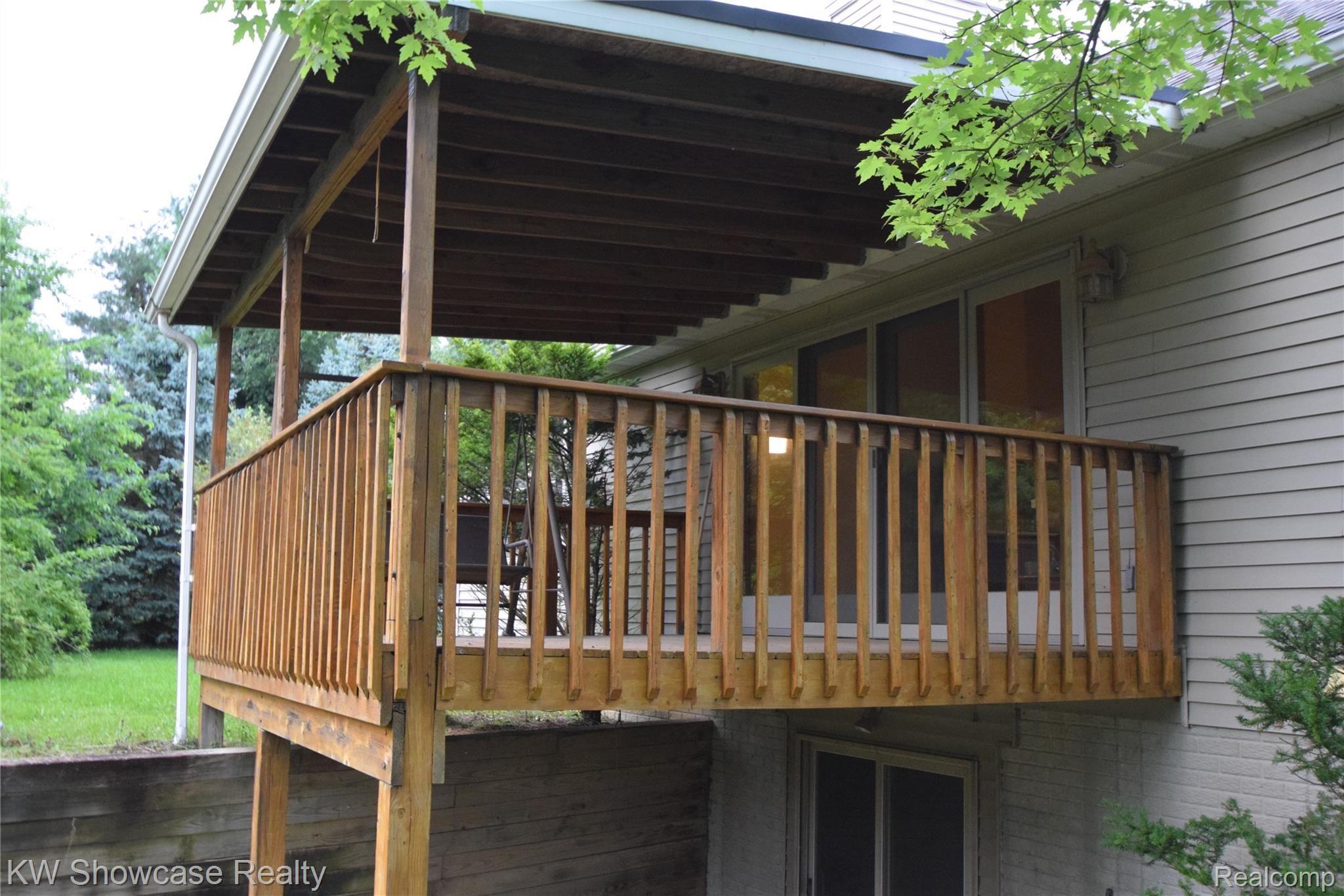 6720 Cedar Lake Road Pinckney, MI 48169 - Photo 7 of 50 Covered Deck