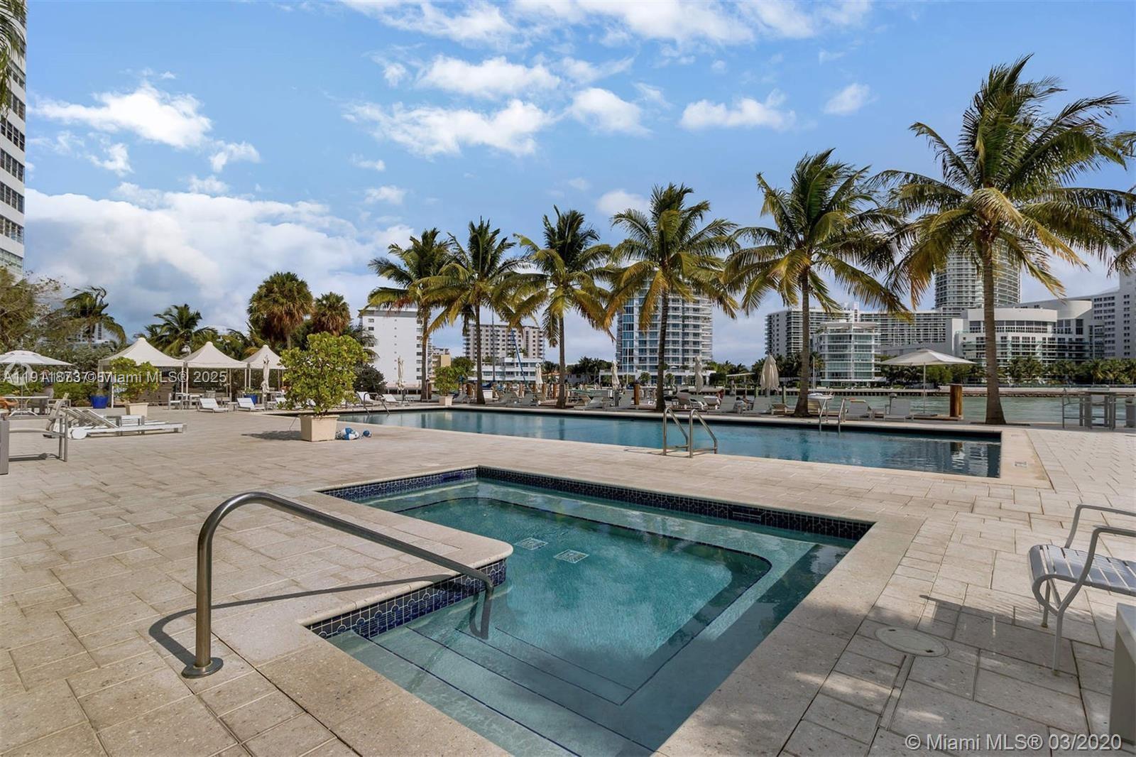 20 Island Avenue, Unit 209 Miami Beach, FL 33139 - Photo 10 of 12 a swimming pool with outdoor seating