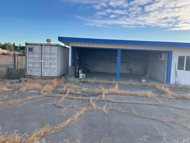 a view of a backyard of a house
