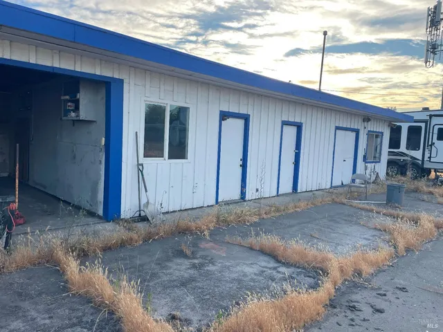 a bathroom with a toilet and a sink