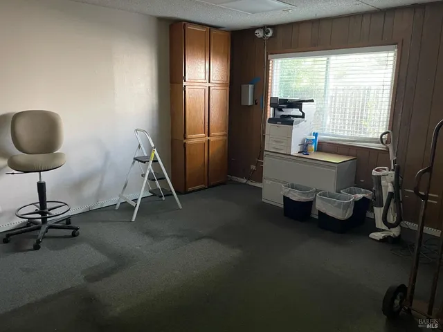 a bathroom with a shower and a sink