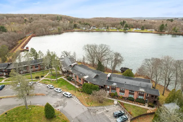 a view of a lake in middle of the town