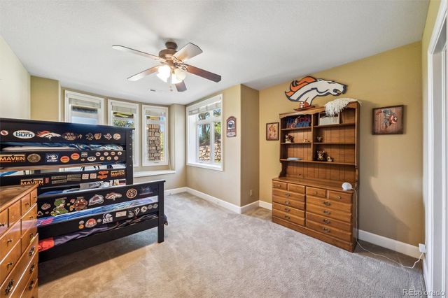 a bedroom with furniture and a bed