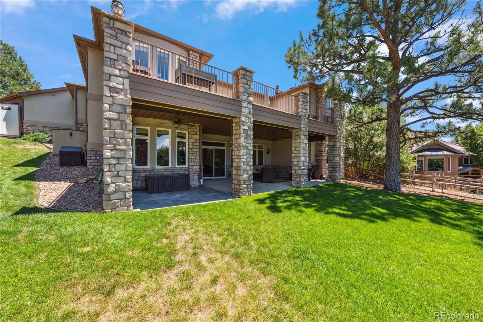 5159 Warbler Court Parker, CO 80134 - Photo 41 of 50 front view of a house with a yard