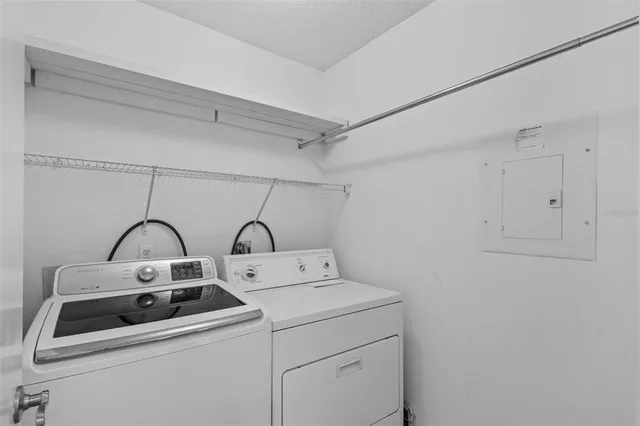 a utility room with dryer and washer