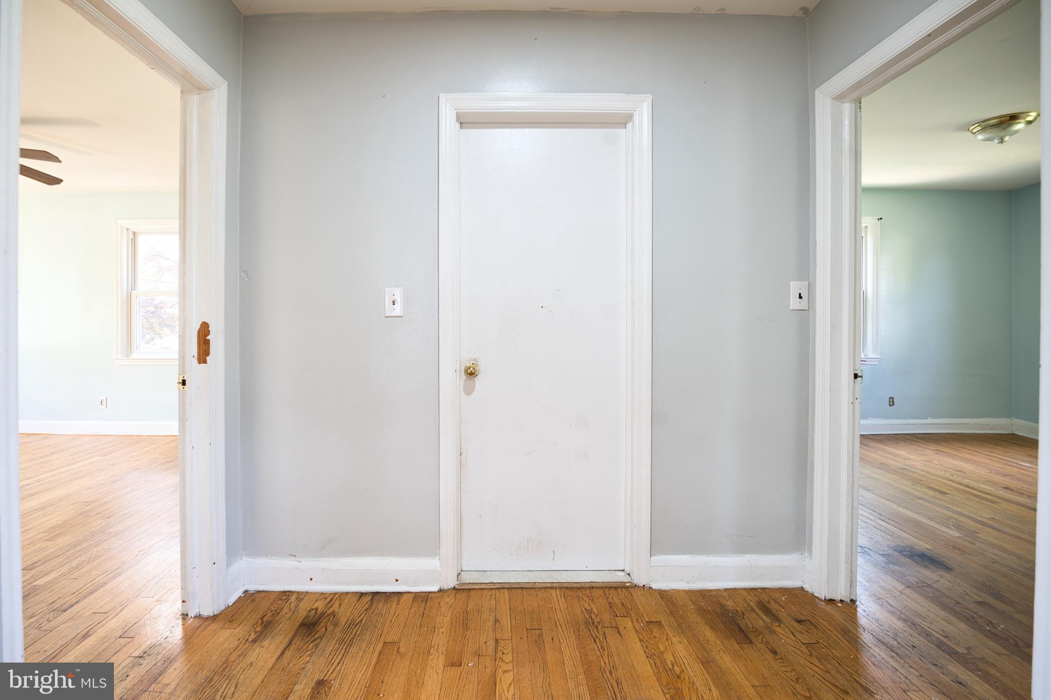 100 9th Avenue Baltimore, MD 21225 - Photo 18 of 38 a view of room with wooden floor
