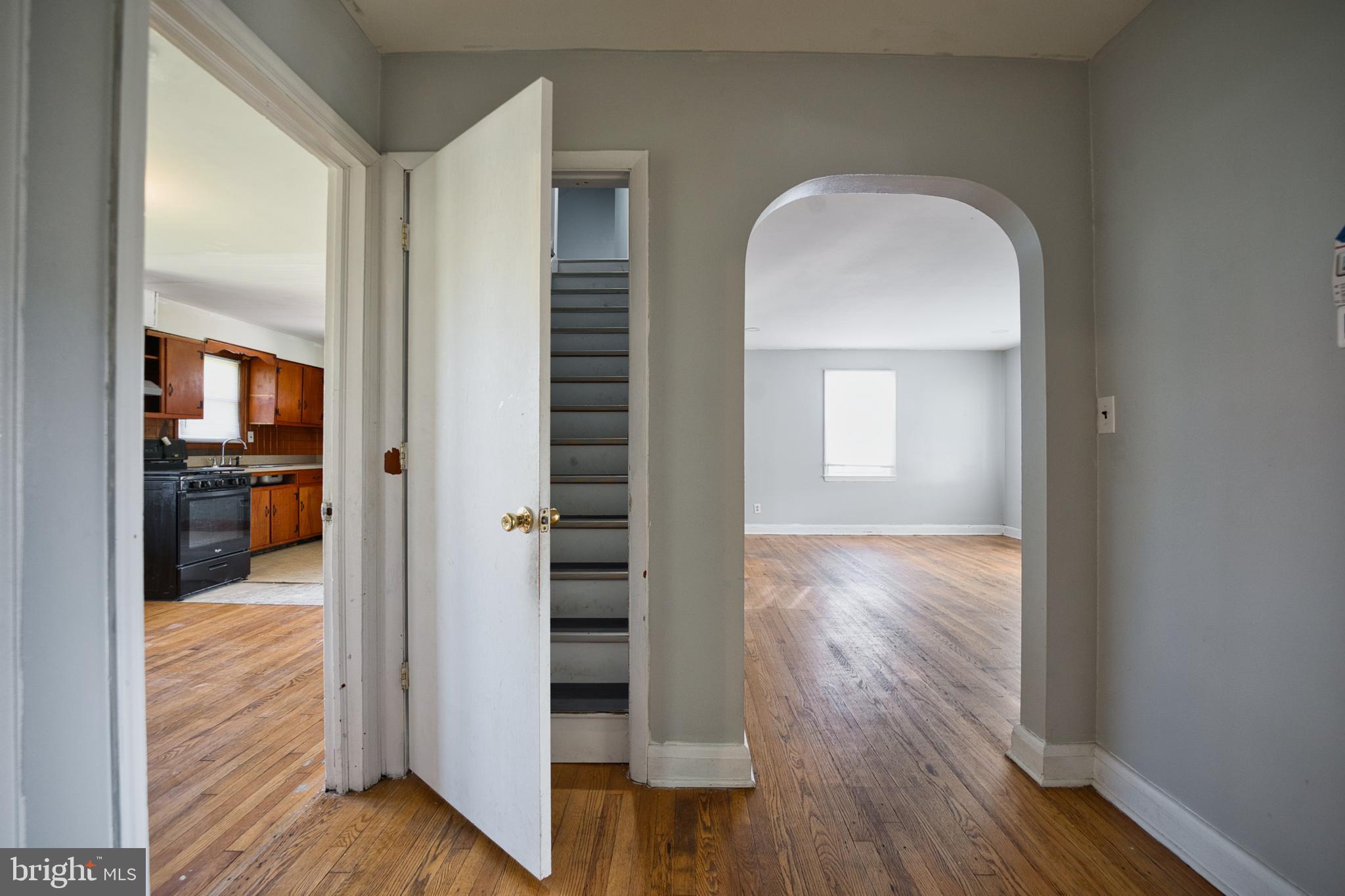 100 9th Avenue Baltimore, MD 21225 - Photo 19 of 38 a view of a room with wooden floor and windows