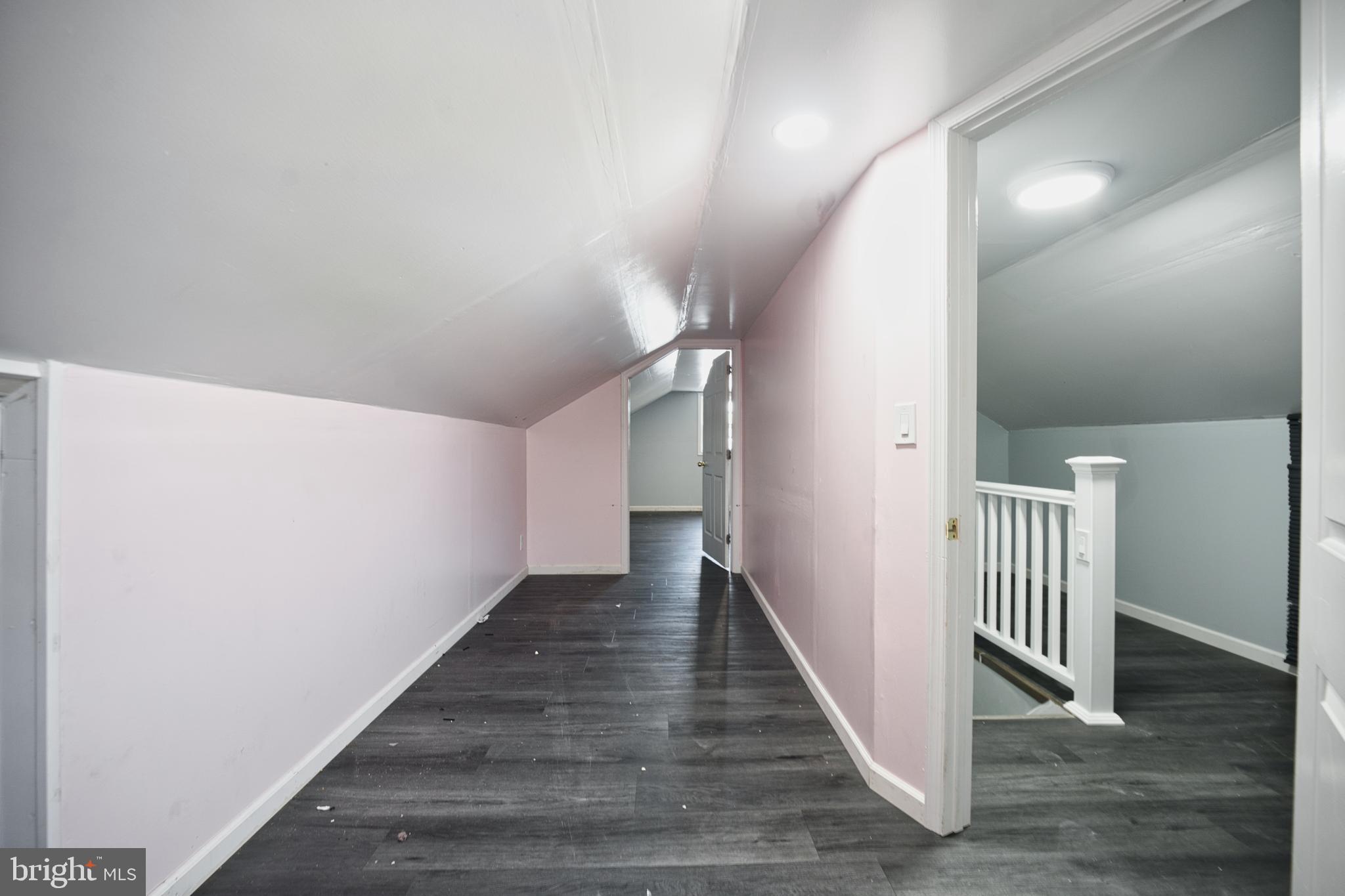100 9th Avenue Baltimore, MD 21225 - Photo 25 of 38 a view of a hallway with wooden floor and entryway