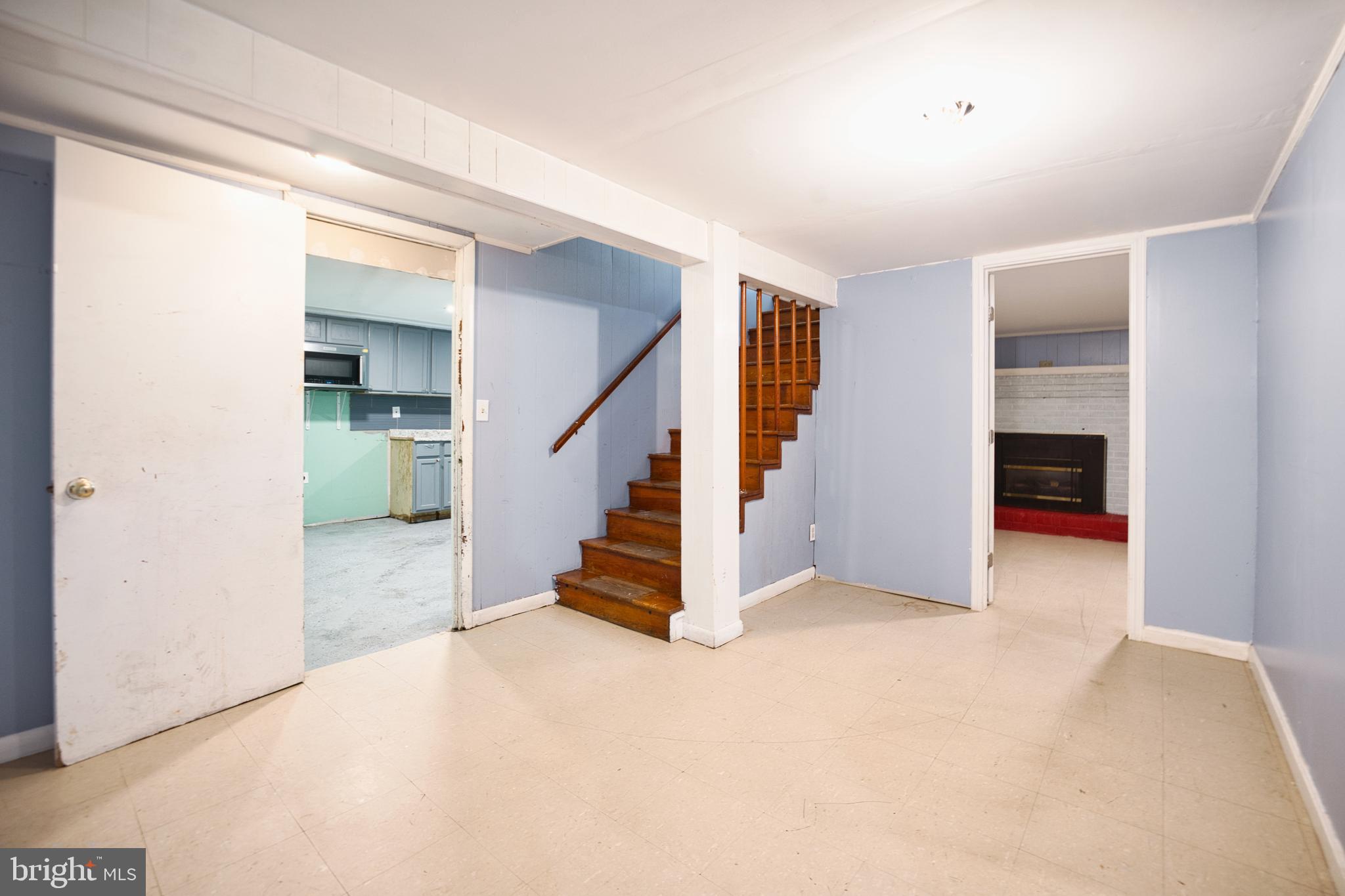 100 9th Avenue Baltimore, MD 21225 - Photo 30 of 38 a view of entryway and hall with a workspace