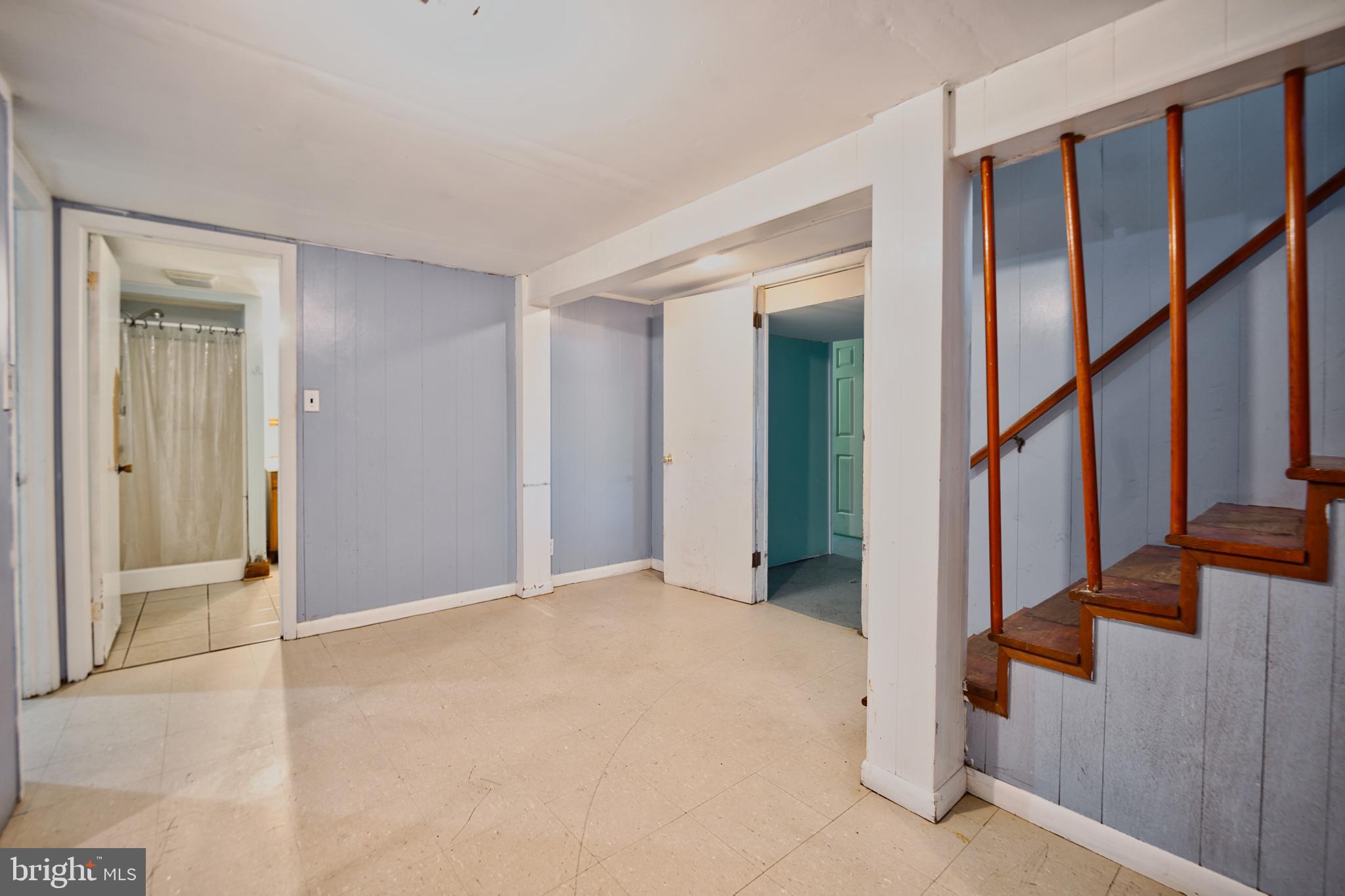 100 9th Avenue Baltimore, MD 21225 - Photo 31 of 38 a view of an entryway with staircase