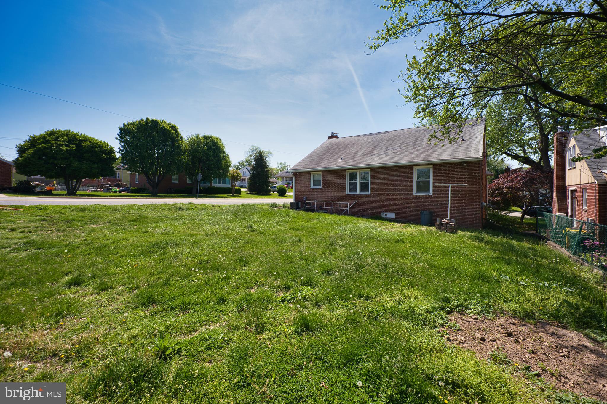 100 9th Avenue Baltimore, MD 21225 - Photo 7 of 38 a view of a house with a big yard